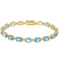 14k Gold Over Sterling Silver Gemstone Tennis Style Bracelet with Blue Topaz